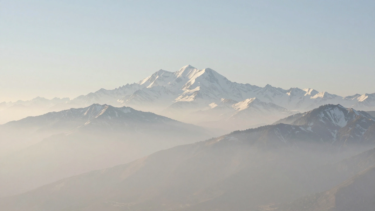 Distant mountains fading into a pale sky using atmospheric perspective.