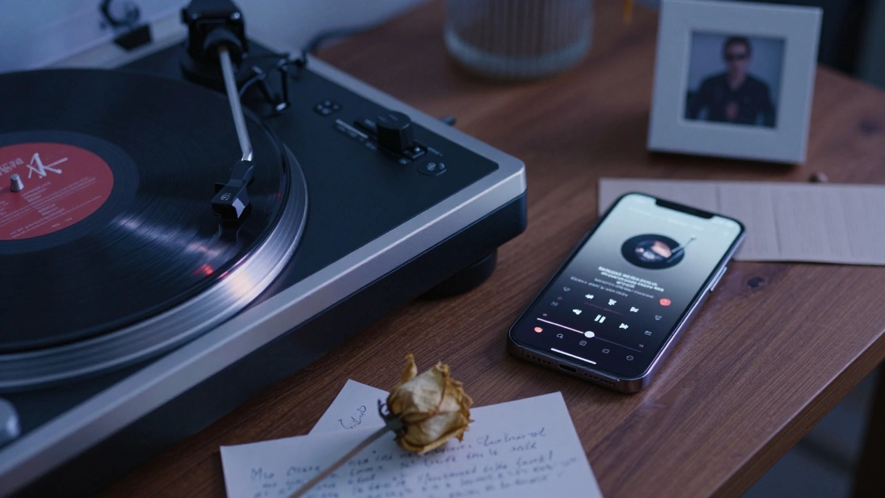 Vinyl record and smartphone showing personalized memorial playlists on a wooden table.
